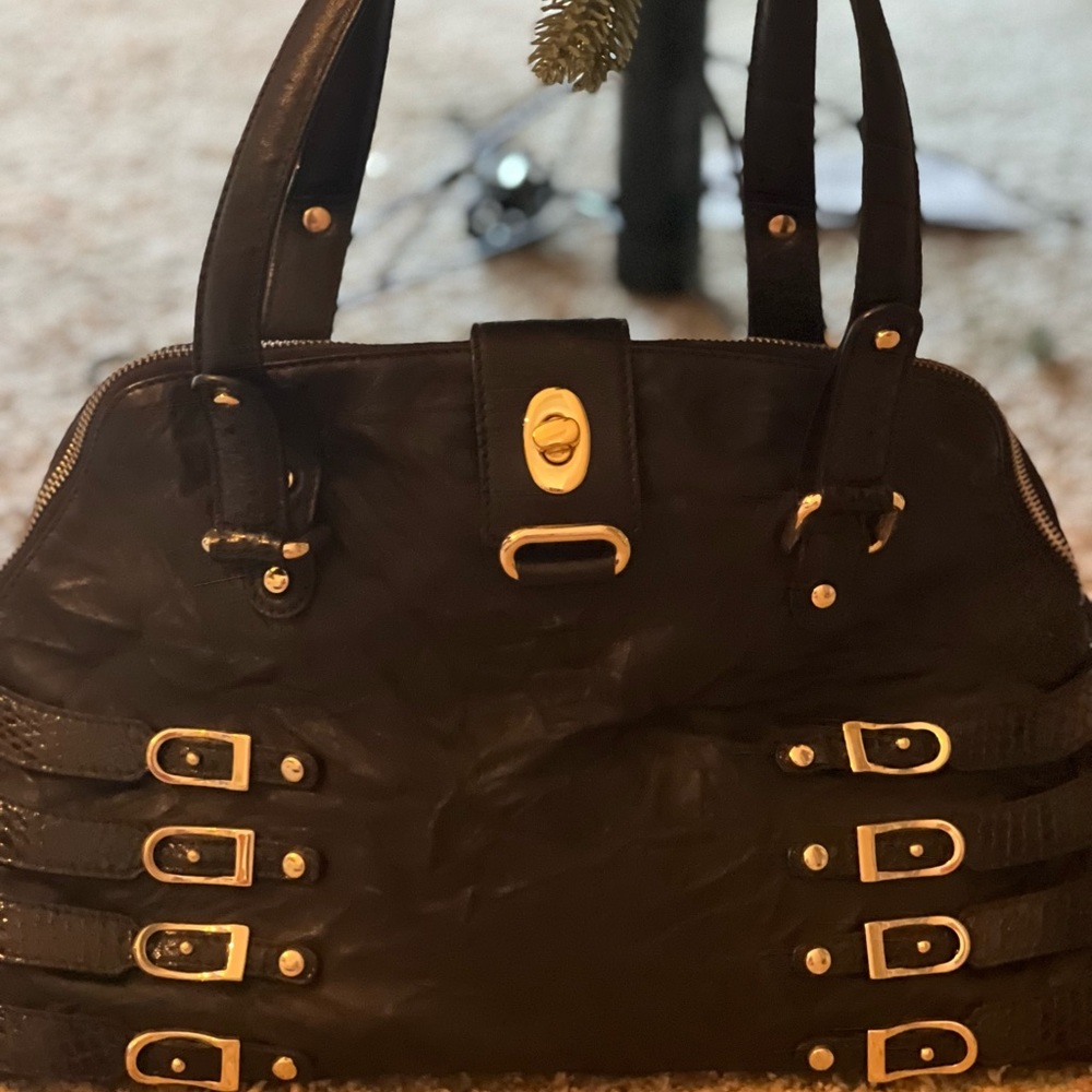 Like new Jimmy Choo purse with yellow suede interior like new inside and out